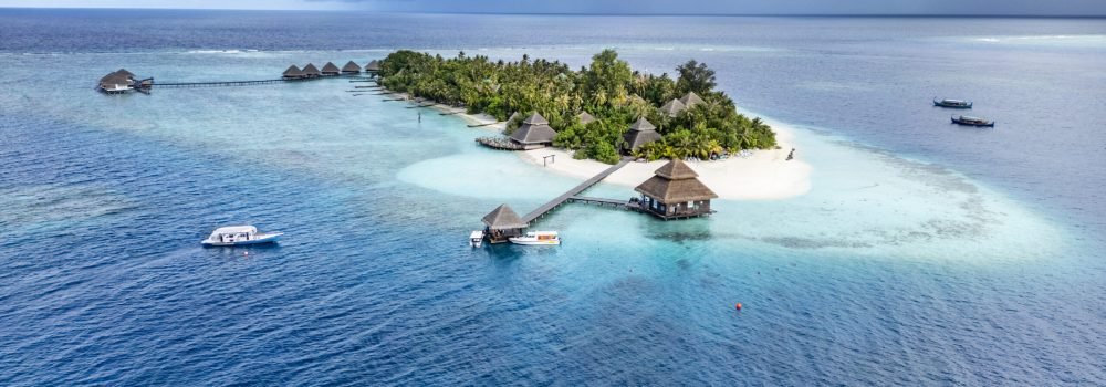 Aerial view of the island of Rannalhi, with the Divepoint Rannalhi at the bottom, Club Andaaran, South Male Atoll, Maldives, Indian Ocean.